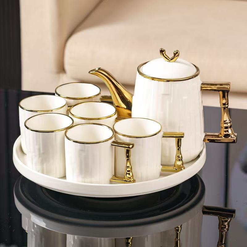 5afacd9b-4156-4598-9672-3f8d259d507b 8 Pcs Elegant White & Gold Tea Set - Image 2