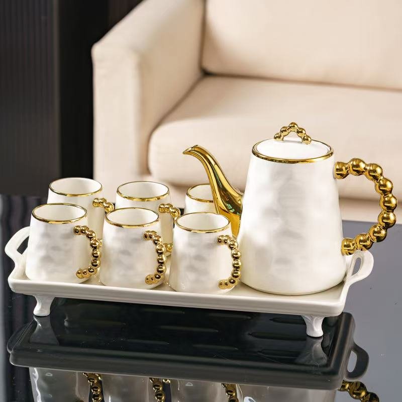 976075e0-ec08-4095-9794-0fcf2ebbe80f 8 Pcs Elegant White & Gold Tea Set - Image 3