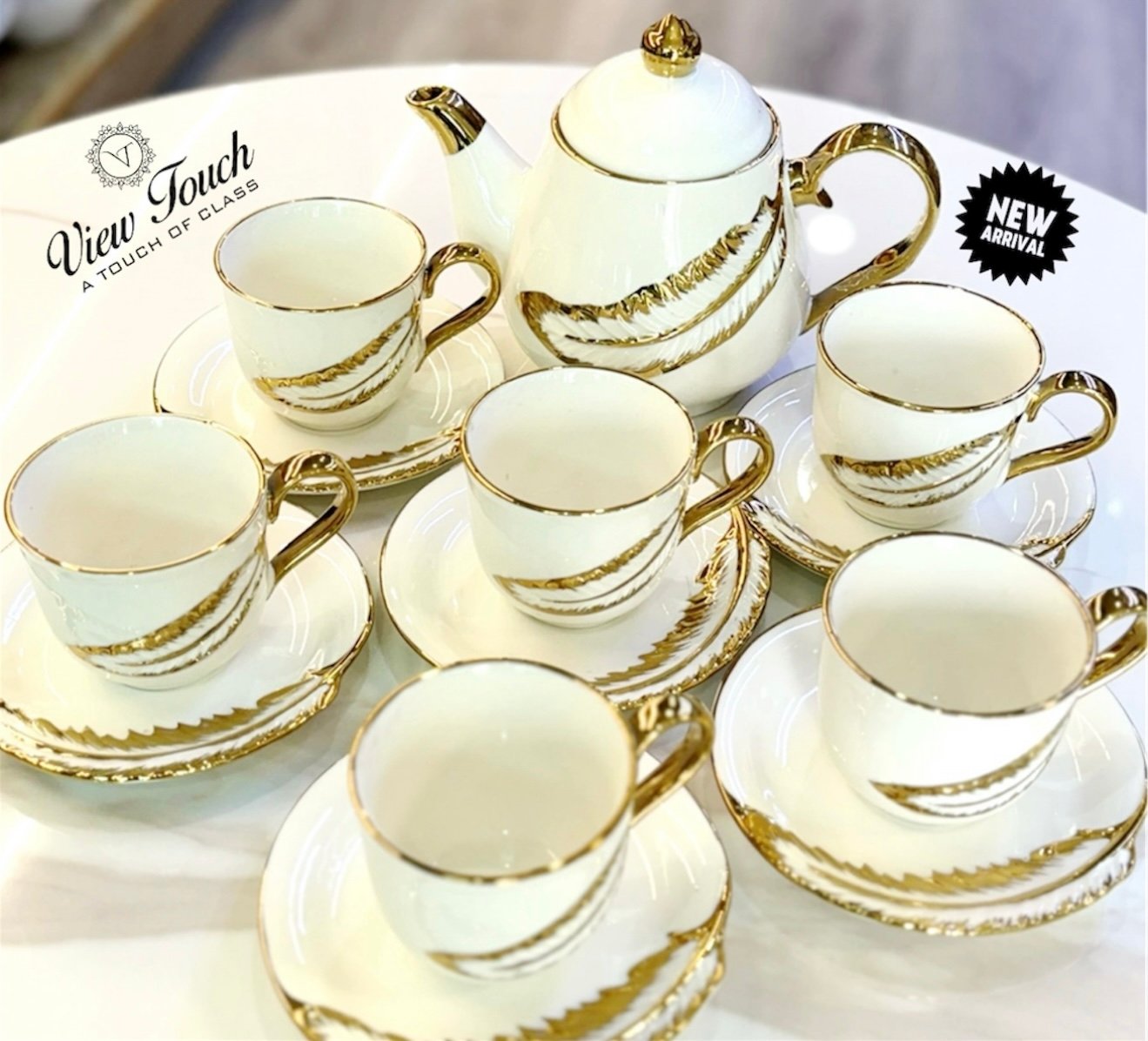 Screenshot Elegant Gold-Trimmed Tea Cups & Saucers Set - Image 1