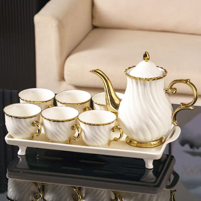 d4789fc2-5ed8-4a91-9b51-063d483990b4 8 Pcs Elegant White & Gold Tea Set - Image 4